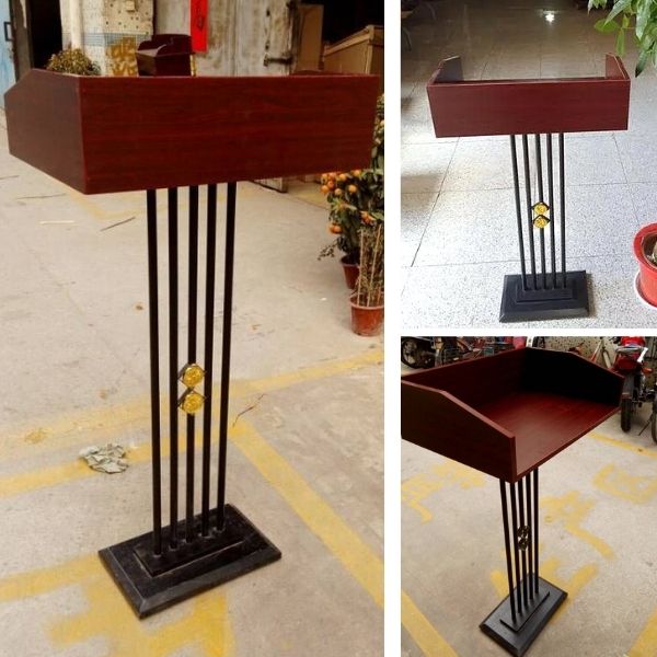 Mặt bàn được làm từ gỗ, phần chân đế và phần khung được làm từ thép phun sơn